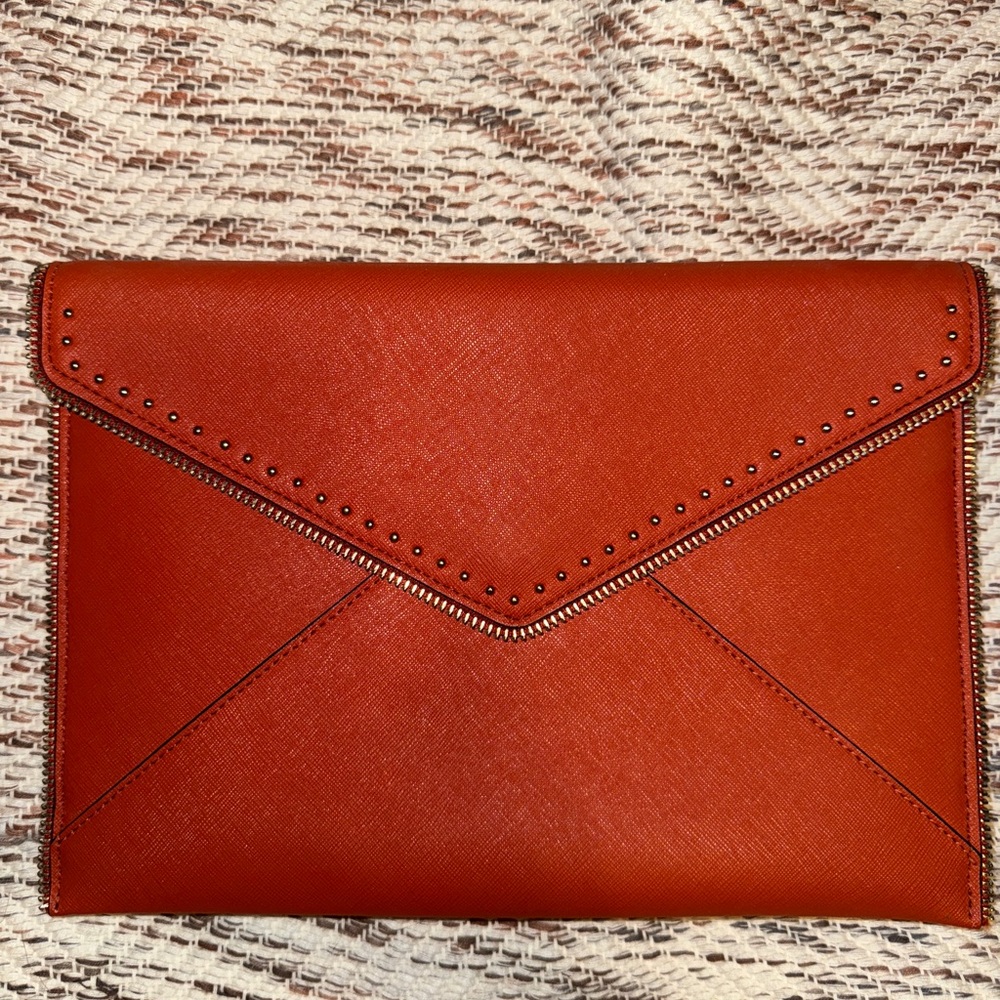 Rebecca Minkoff studded envelope clutch in orange